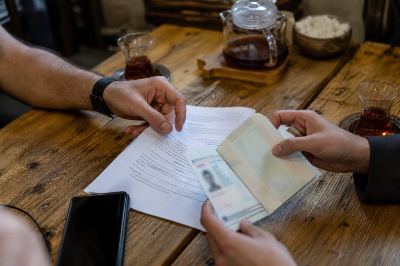 Work documents reviewed at the KapHub desk in Yerevan